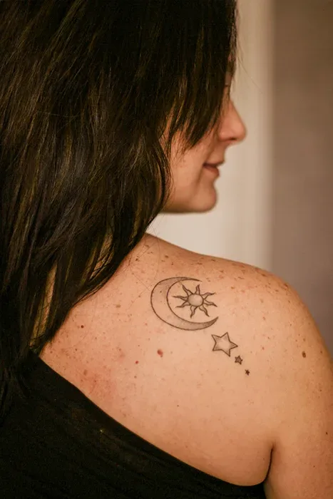 woman with tatoo moon